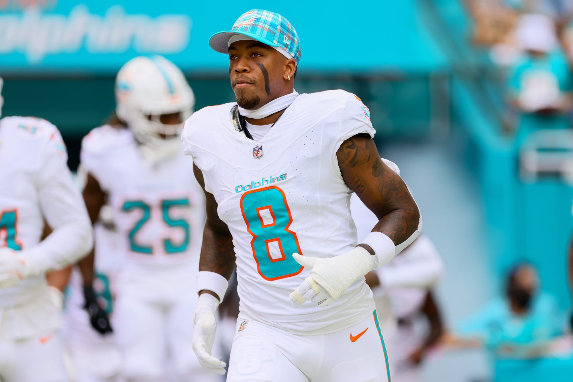 Oct 27, 2024; Miami Gardens, Florida, USA; Miami Dolphins safety Jevon Holland (8) enters the field before the game against the Arizona Cardinals at Hard Rock Stadium.