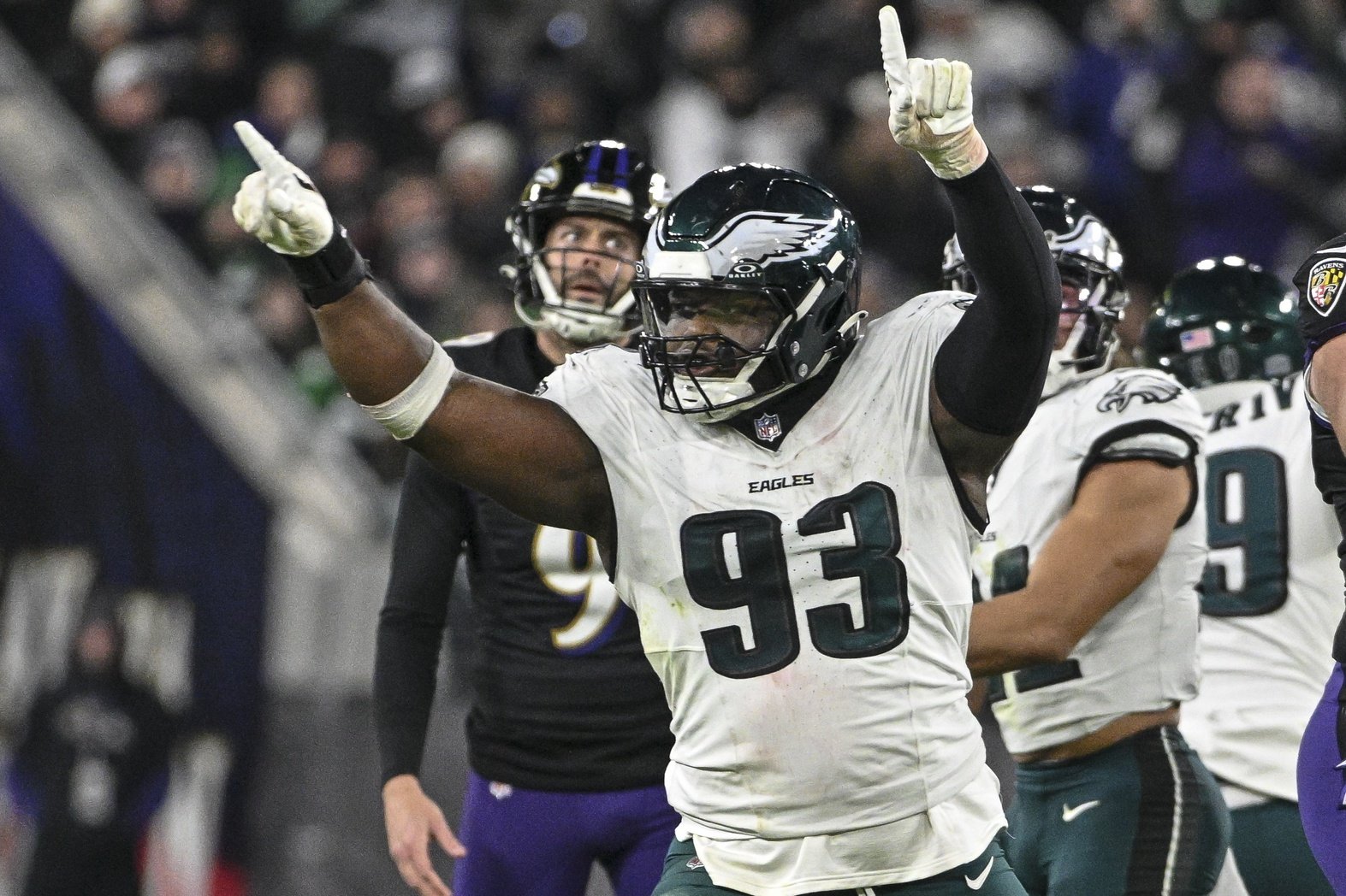 Dec 1, 2024; Baltimore, Maryland, USA; Philadelphia Eagles defensive tackle Milton Williams (93) celebrates as Baltimore Ravens place kicker Justin Tucker (9) reacts to missing a second half field goal at M&T Bank Stadium.