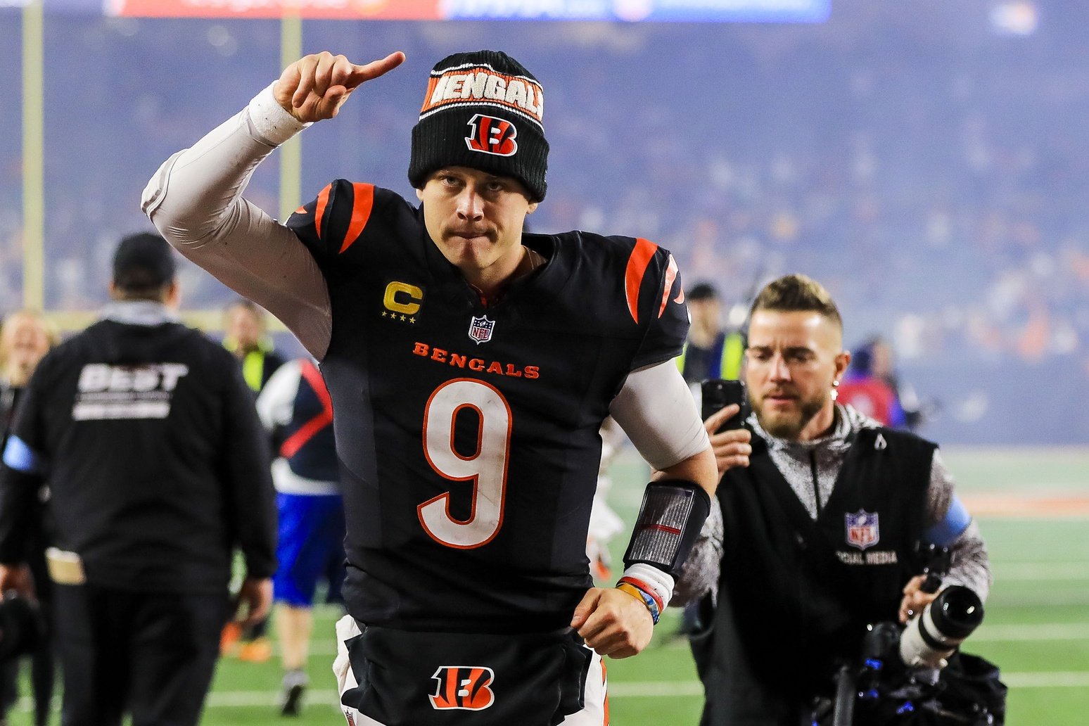 Dec 28, 2024; Cincinnati, Ohio, USA; Cincinnati Bengals quarterback Joe Burrow (9) runs off the field after the victory over the Denver Broncos at Paycor Stadium.