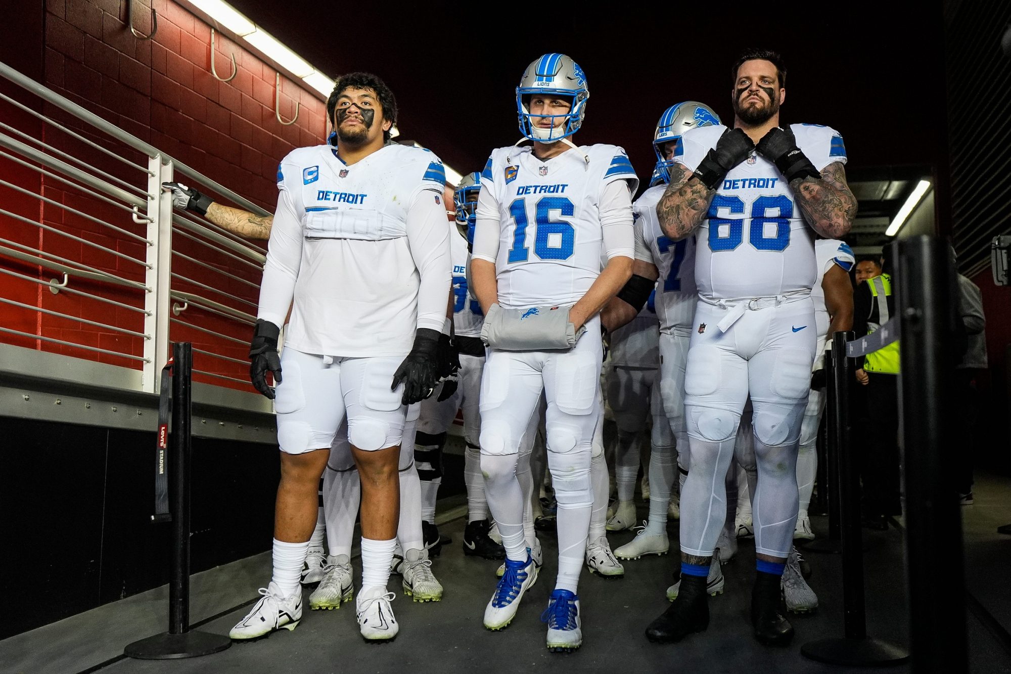 From left, Detroit Lions offensive tackle Penei Sewell (58), quarterback Jared Goff (16) and offensive tackle Taylor Decker (68), ready to take the field against San Francisco 49ers at Levi's Stadium in Santa Clara, Calif. on Monday, Dec. 30, 2024.