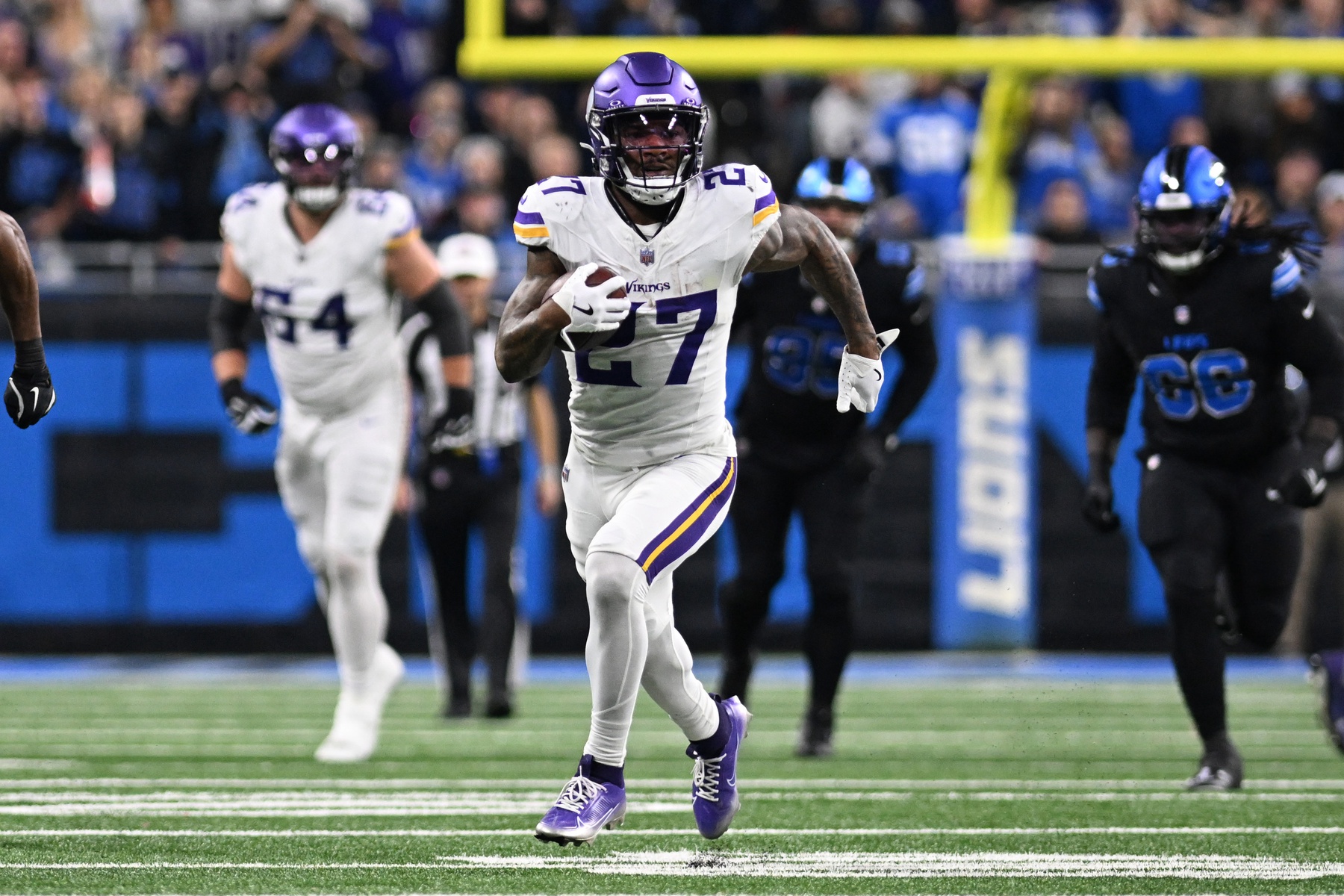 Jan 5, 2025; Detroit, Michigan, USA; Minnesota Vikings running back Cam Akers (27) breaks off a long run against the Detroit Lions in the third quarter at Ford Field.