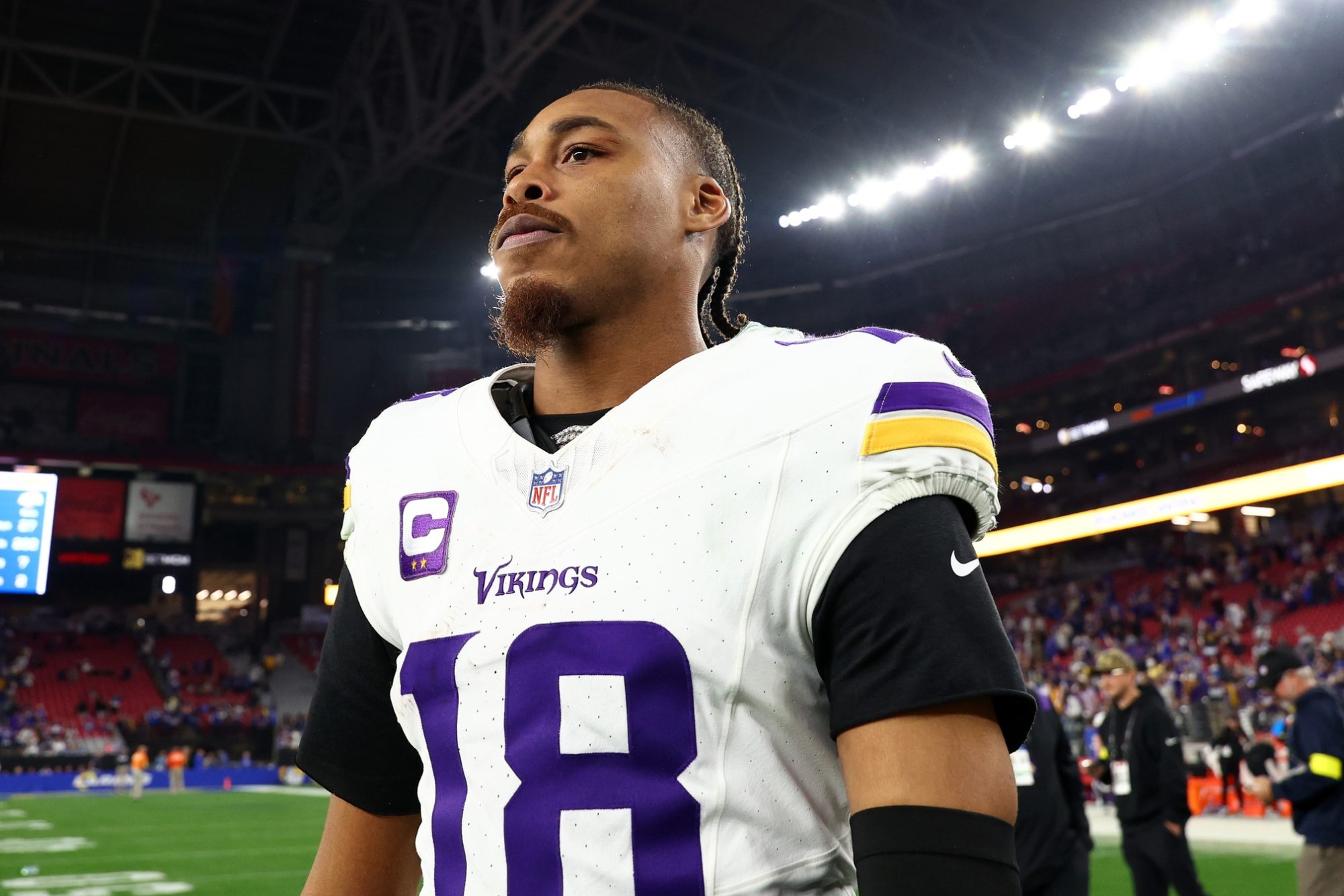 Jan 13, 2025; Glendale, AZ, USA; Minnesota Vikings wide receiver Justin Jefferson (18) reacts after the NFC wild card game against the Los Angeles Rams at State Farm Stadium.