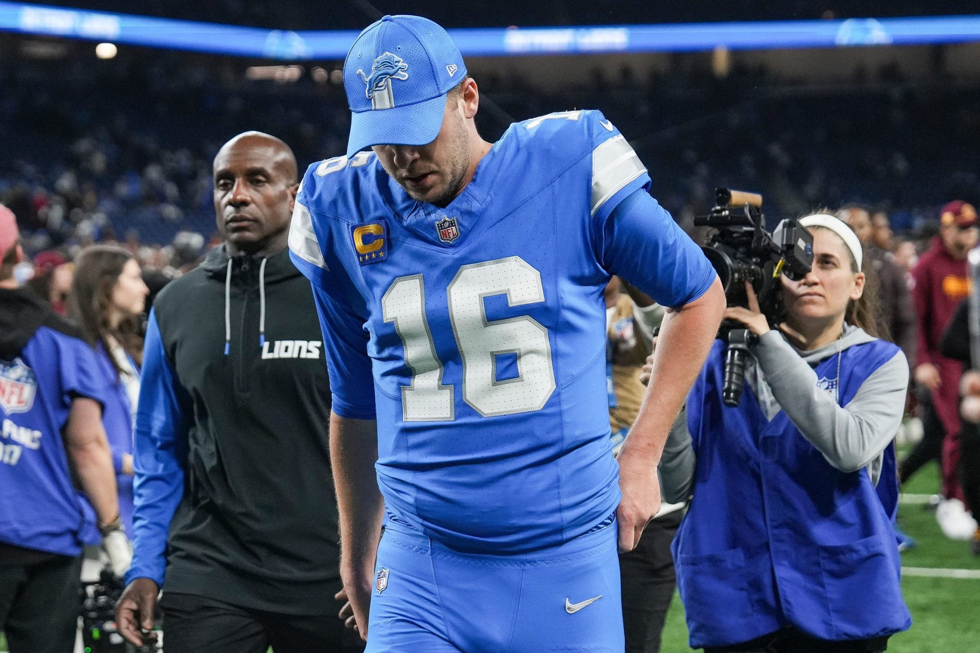 Detroit Lions quarterback Jared Goff (16) walks off the field after 45-31 loss to Washington Commanders at the NFC divisional round at Ford Field in Detroit on Saturday, Jan. 18, 2025.