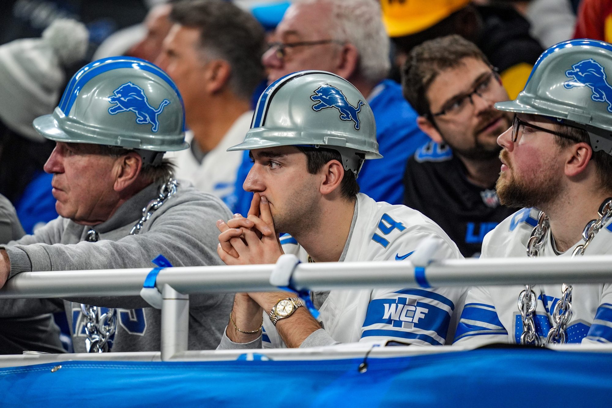 Detroit Lions fans react after the 45-31 loss to the Washington Commanders in the NFC divisional round of the NFL playoffs at Ford Field in Detroit on Saturday, Jan. 18, 2025.