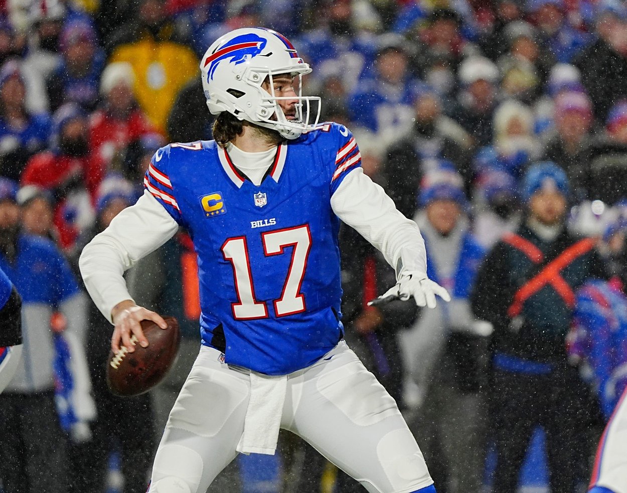 Buffalo Bills quarterback Josh Allen, ready to throw a pass, watches his receiver get into a position during first half action at the Buffalo Bills divisional game against the Baltimore Ravens at Highmark Stadium in Orchard Park on Jan. 19, 2025.