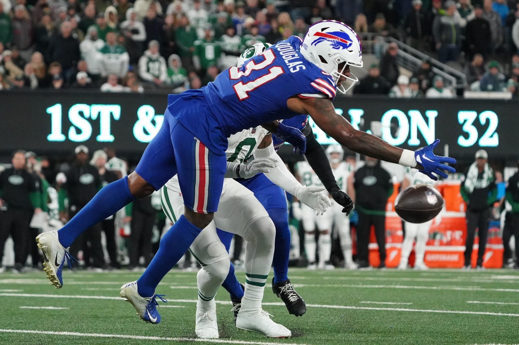 Oct 14, 2024; East Rutherford, New Jersey, USA; Buffalo Bills cornerback Rasul Douglas (31) defends a pass to New York Jets running back Braelon Allen (0) during the second half at MetLife Stadium.