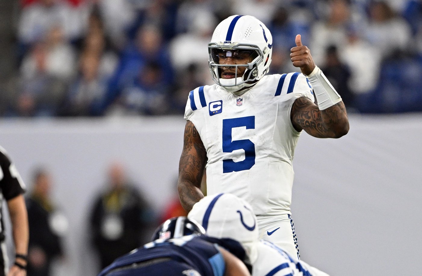 Dec 22, 2024; Indianapolis, Indiana, USA; Indianapolis Colts quarterback Anthony Richardson (5) gives a thumbs up before the snap during the second half against the Tennessee Titans at Lucas Oil Stadium.