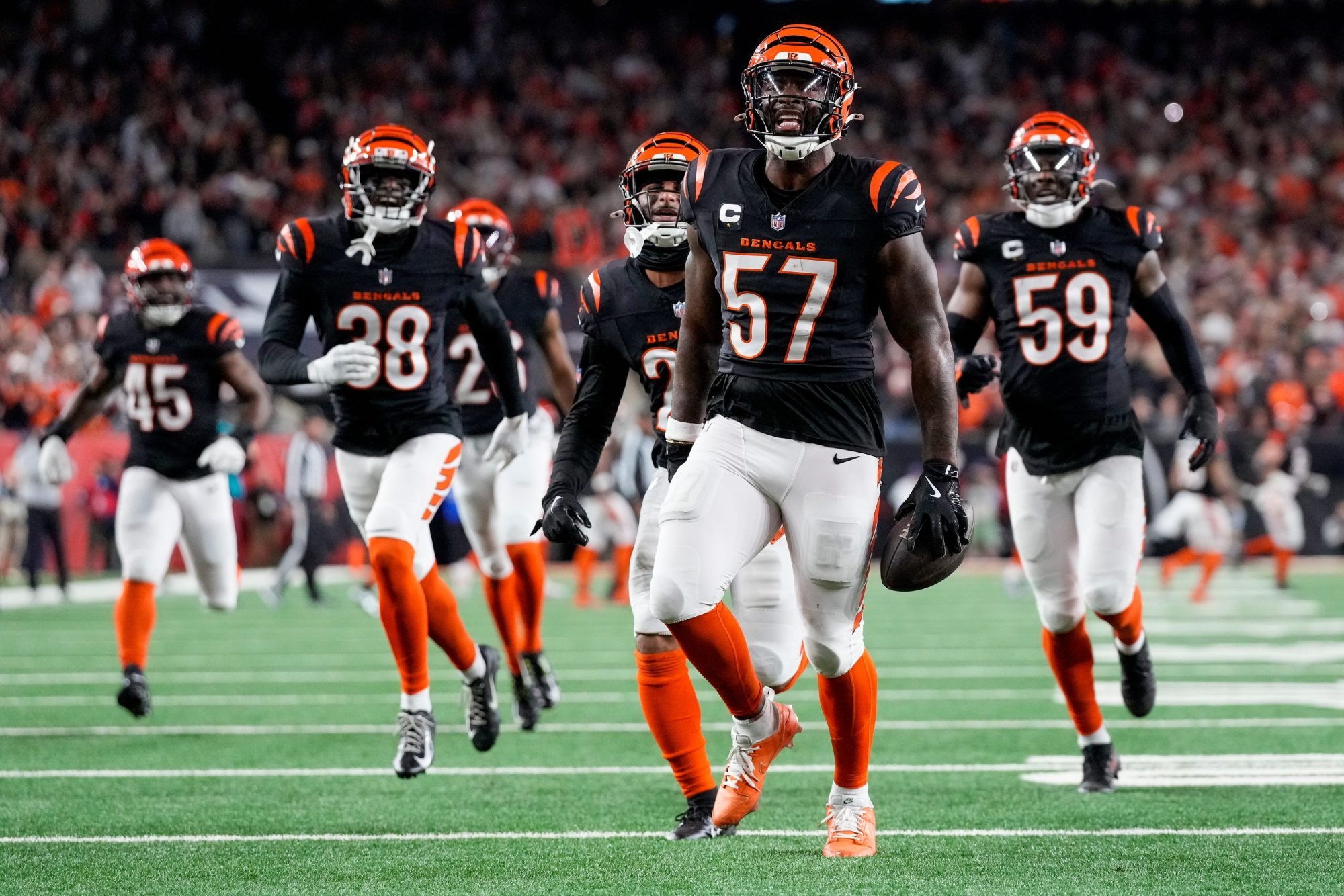 Cincinnati Bengals linebacker Germaine Pratt (57) celebrates an interception in the fourth quarter of the NFL Week 17 game between the Cincinnati Bengals and the Denver Broncos at Paycor Stadium in downtown Cincinnati on Saturday, Dec. 28, 2024. The Bengals took a 30-24 win in overtime to remain in the post season chase.