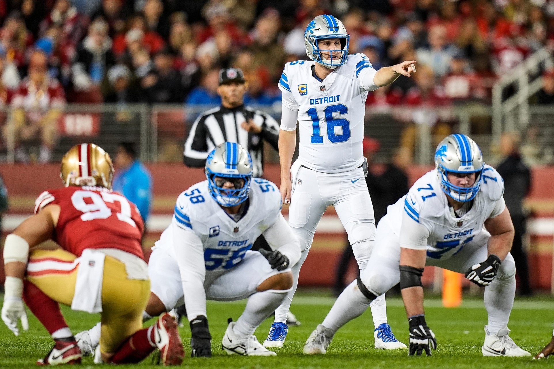 Detroit Lions quarterback Jared Goff (16) talks to teammates before a snap against San Francisco 49ers during the first half at Levi's Stadium in Santa Clara, Calif. on Monday, Dec. 30, 2024.