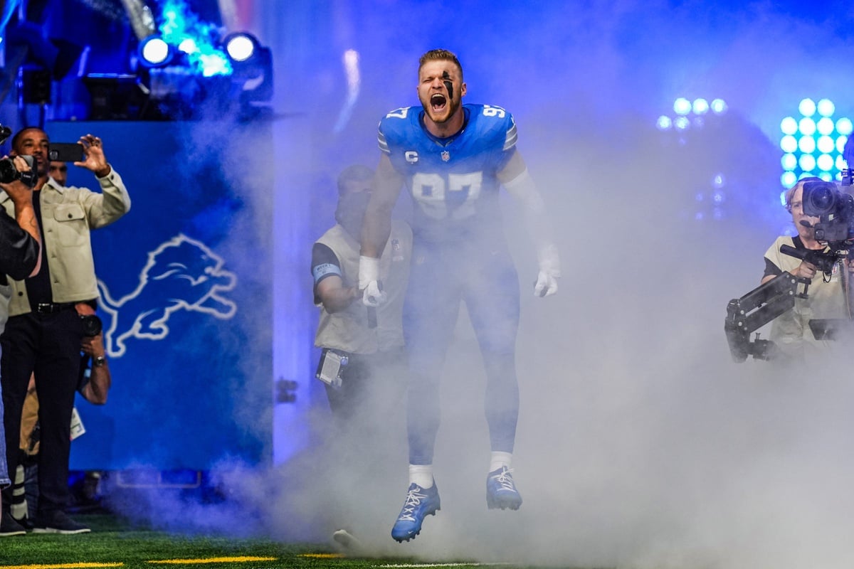 Detroit Lions' Aidan Hutchinson runs out of the tunnel during the Detroit Lions season opener against the Los Angeles Rams at Ford Field in Detroit on Sunday, Sept. 8. 2024.